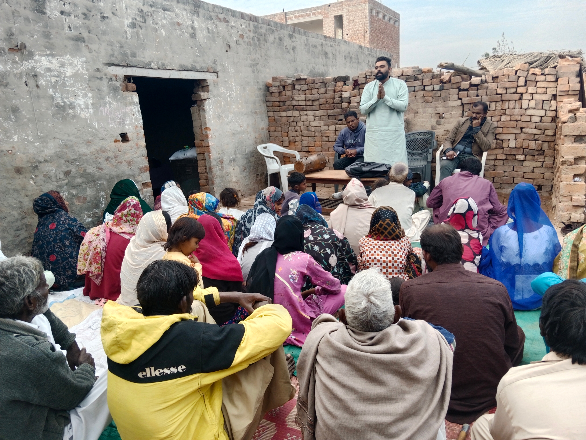 Pastor Shahzad Rafaqat preaching the Gospel to a gathering in a backward area of Pakistan