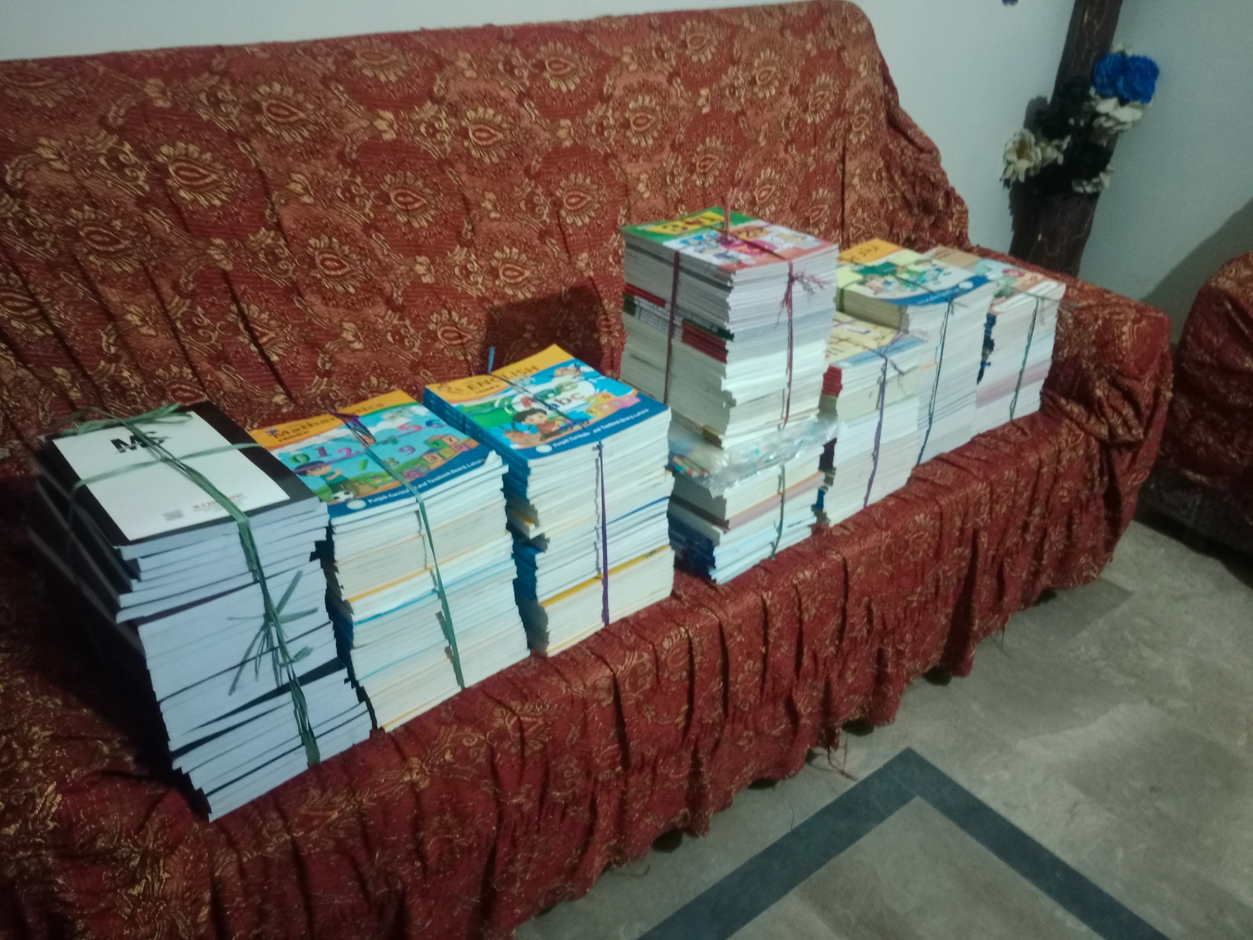 Stacks of textbooks prepared for distribution