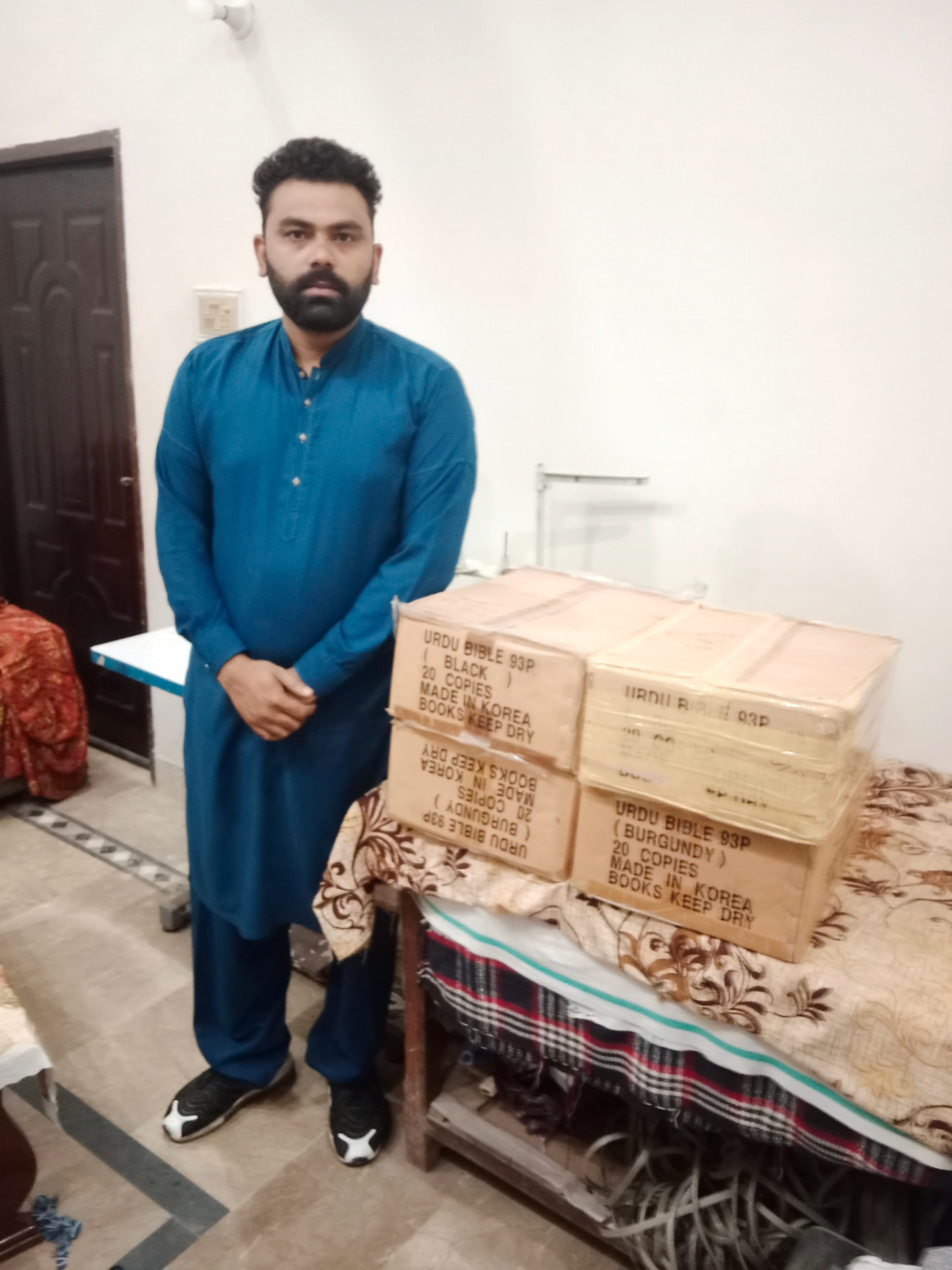 Cartons of new Urdu Bibles prepared by The Revival Center Pakistan for free distribution across Pakistan